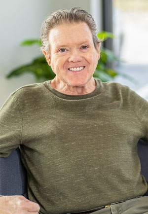 Portrait image of a patient who received New Teeth In One Day treatment.
