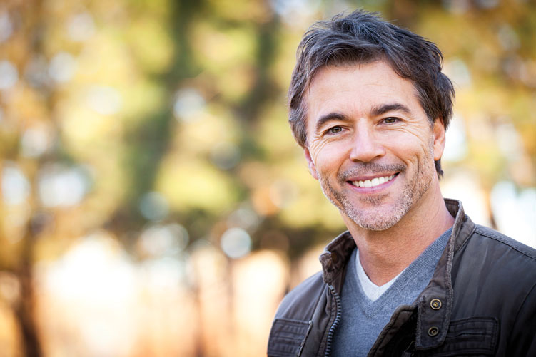 Stock image of a man smiling.